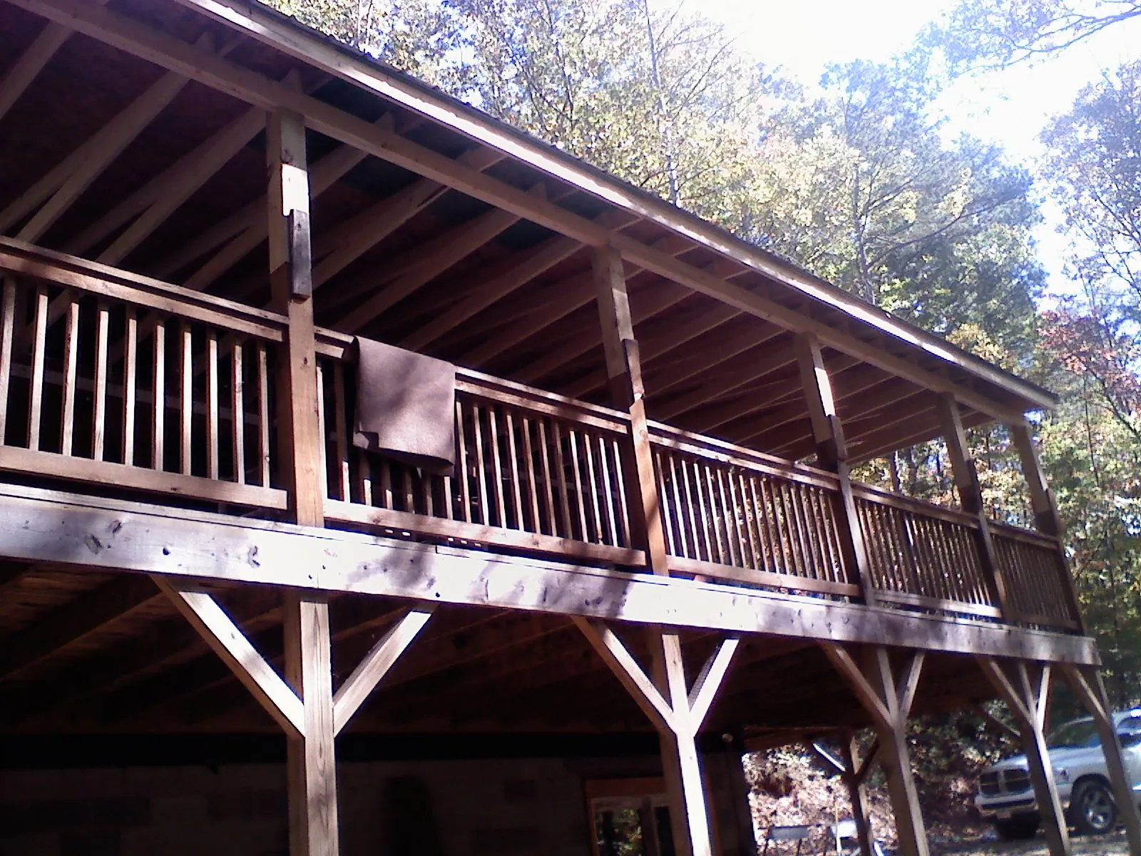 Timber framing under a new elevated porch and deck — Roof Leak Repair in Sag Harbor by Roofing Brothers